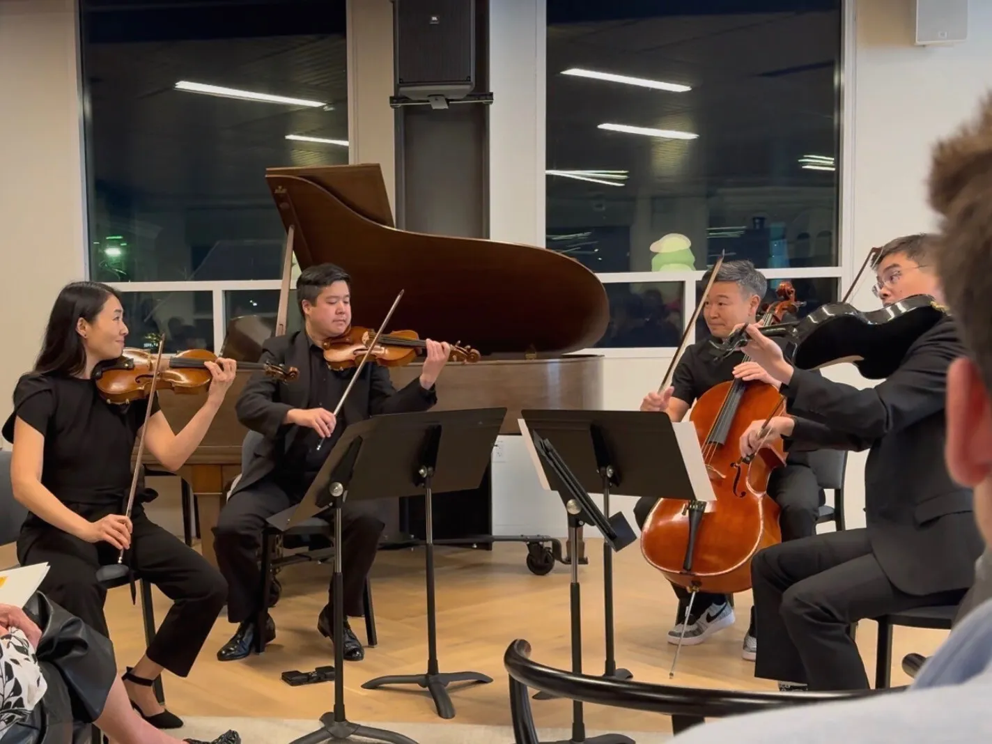 Tell Quartet performing together before an audience